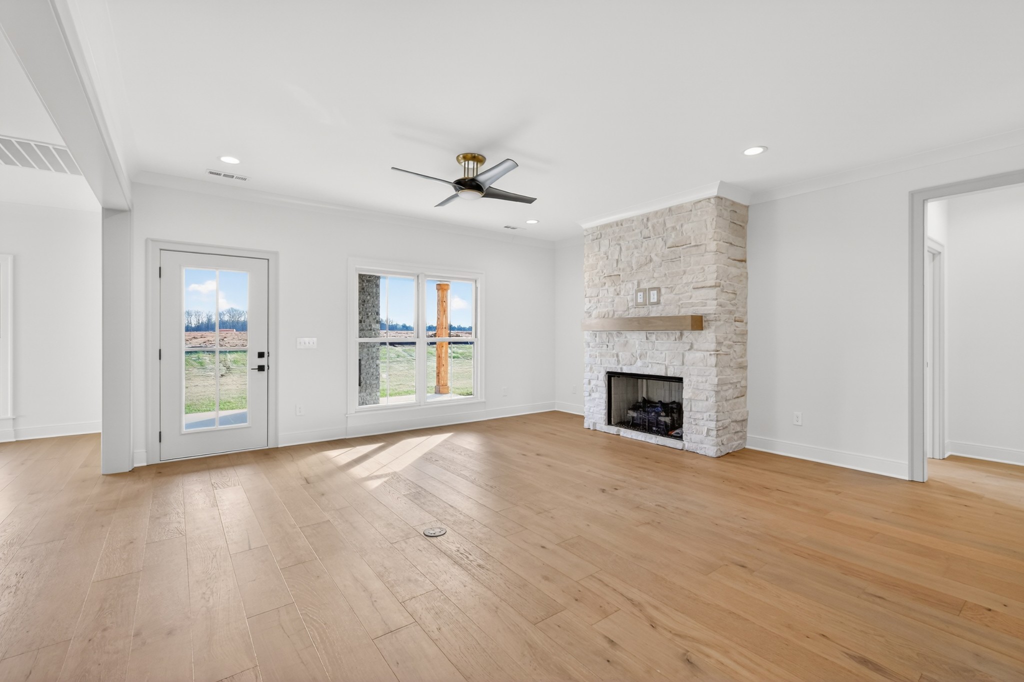5541 Sinclair Street Murfreesboro, TN 37127 - Photo 14 of 58 a view of an empty room with window and fire place