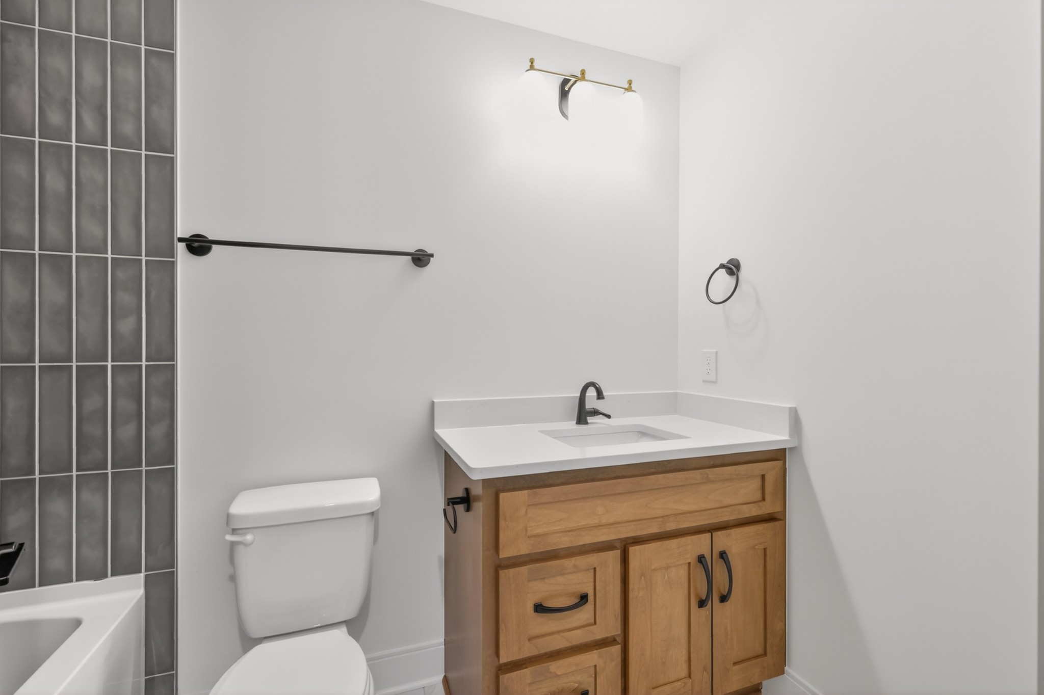 5541 Sinclair Street Murfreesboro, TN 37127 - Photo 47 of 58 a bathroom with a sink toilet vanity and shower