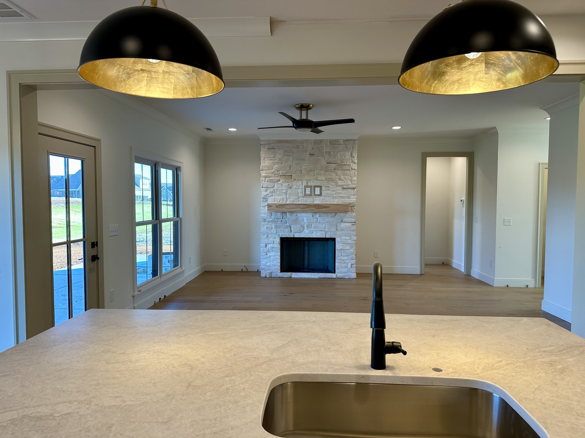 5541 Sinclair Street Murfreesboro, TN 37127 - Photo 7 of 29 a kitchen with a sink and chandelier