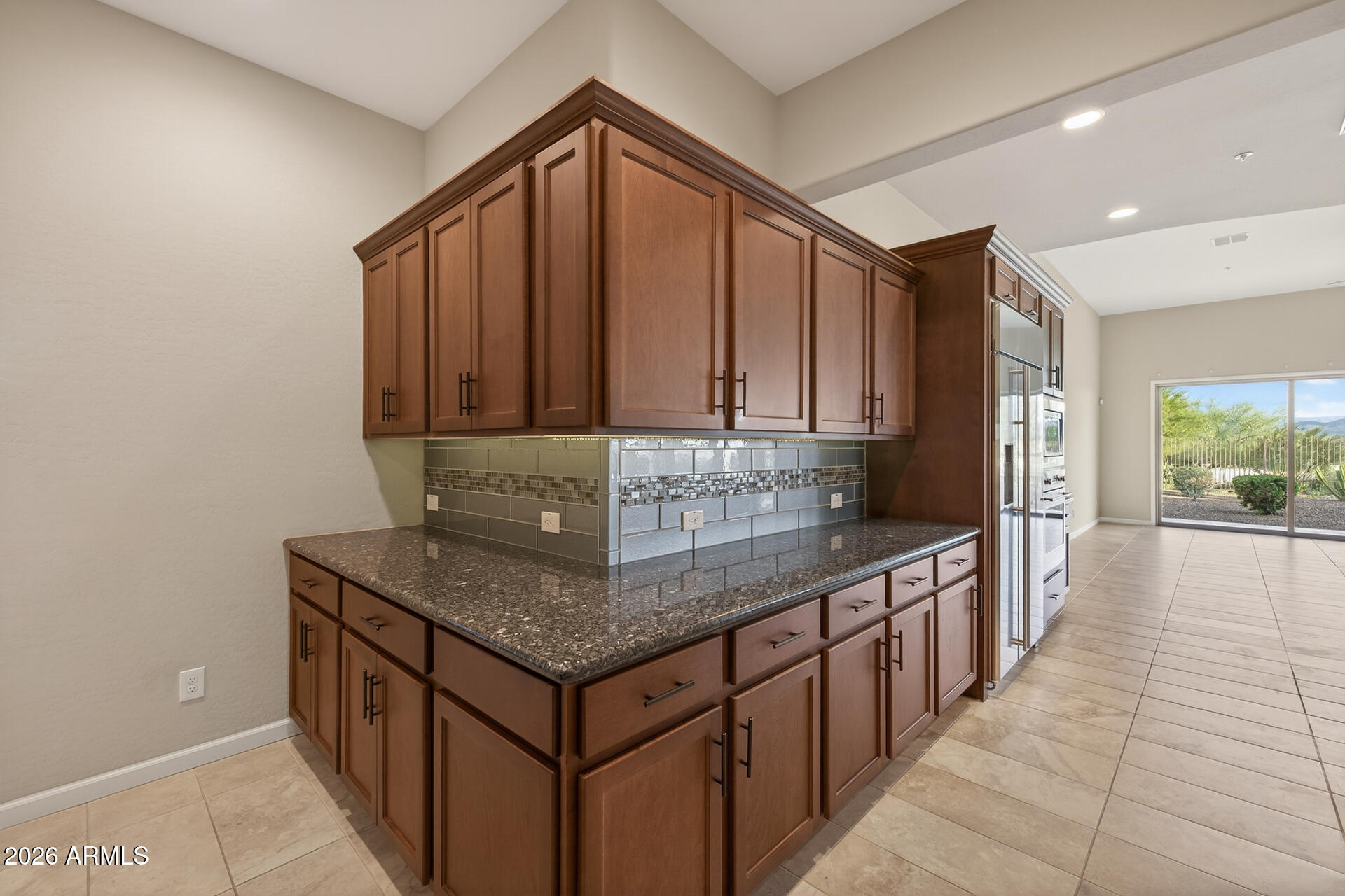 17662 Blaze Lane Rio Verde, AZ 85263 - Photo 15 of 68 a kitchen with stainless steel appliances granite countertop a sink and cabinets