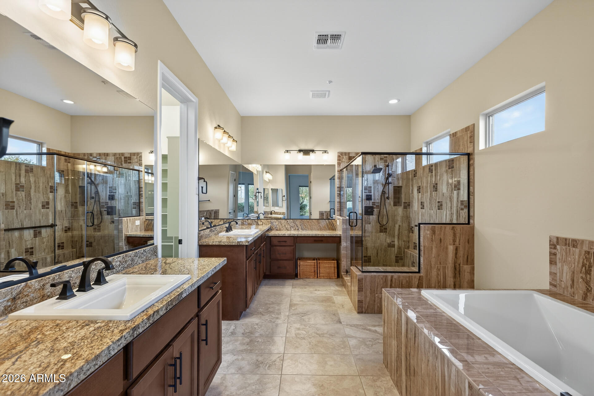 17662 Blaze Lane Rio Verde, AZ 85263 - Photo 21 of 68 a large bathroom with a tub a sink double vanity and shower