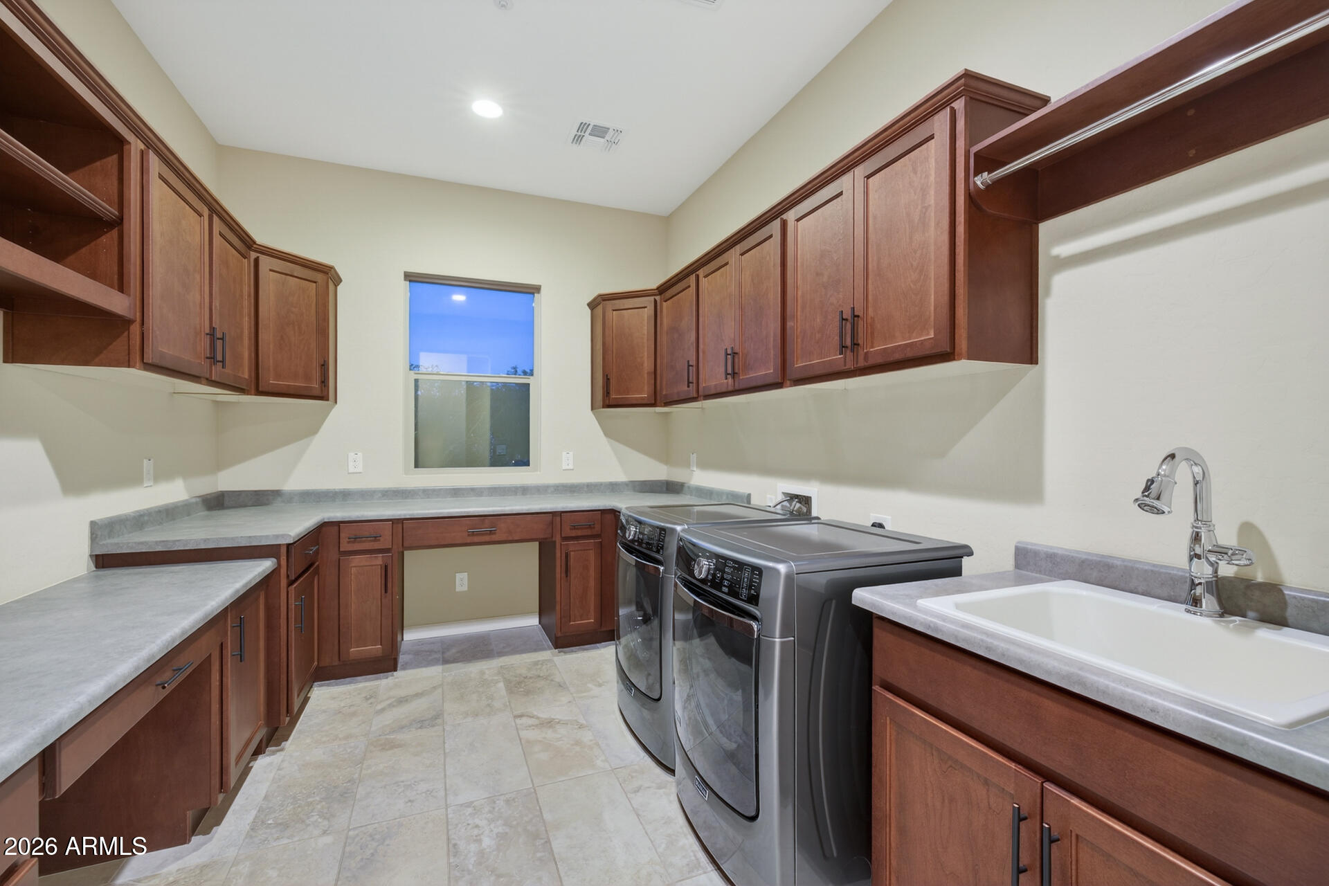 17662 Blaze Lane Rio Verde, AZ 85263 - Photo 30 of 68 a kitchen with a sink stove and cabinets