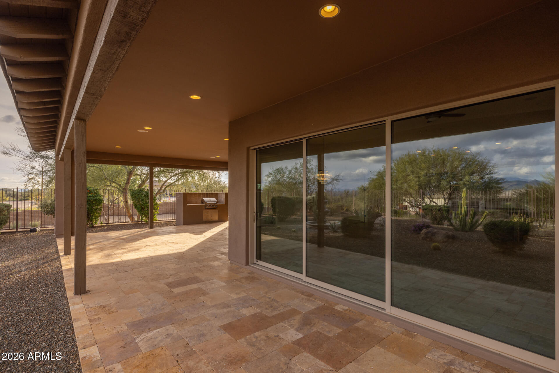 17662 Blaze Lane Rio Verde, AZ 85263 - Photo 36 of 68 a empty room with sliding glass door and glass door