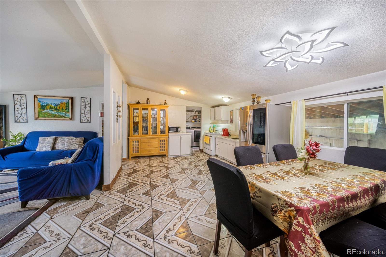 2625 Pheasant Street Denver, CO 80260 - Photo 5 of 18 a view of a dining room with furniture
