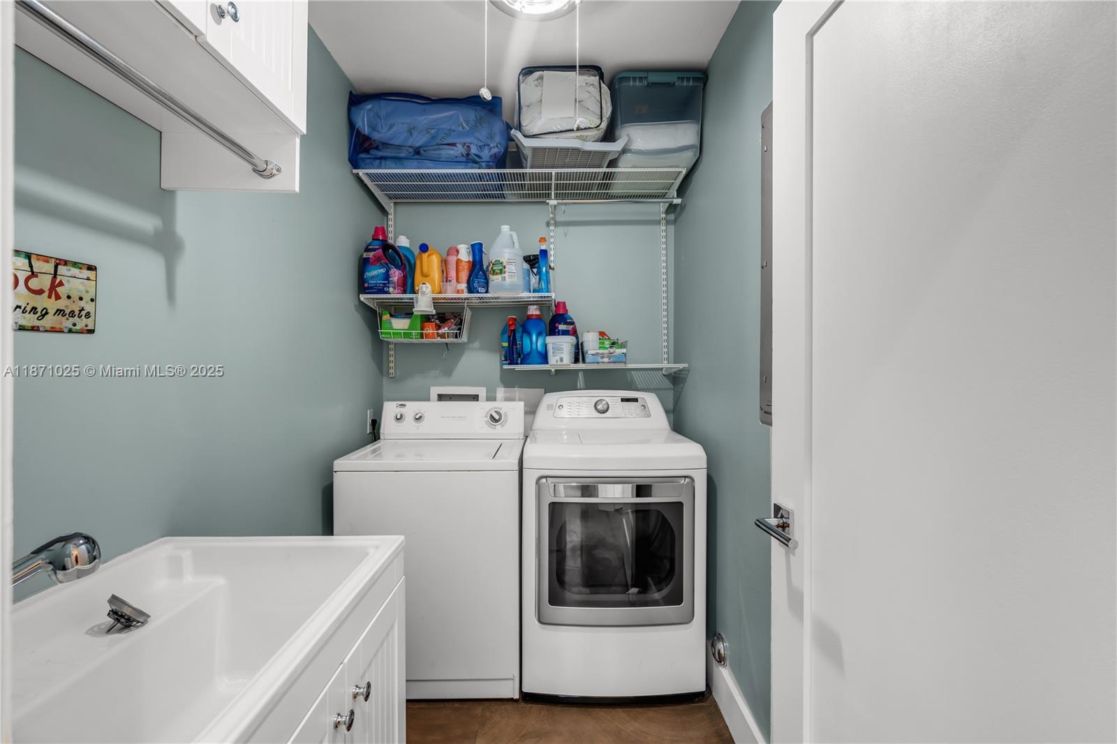 11835 Southwest 91 Avenue Miami, FL 33176 - Photo 18 of 66 a utility room with dryer and washer