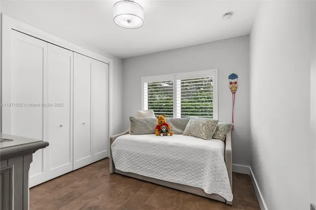 a bathroom with a large tub and shower