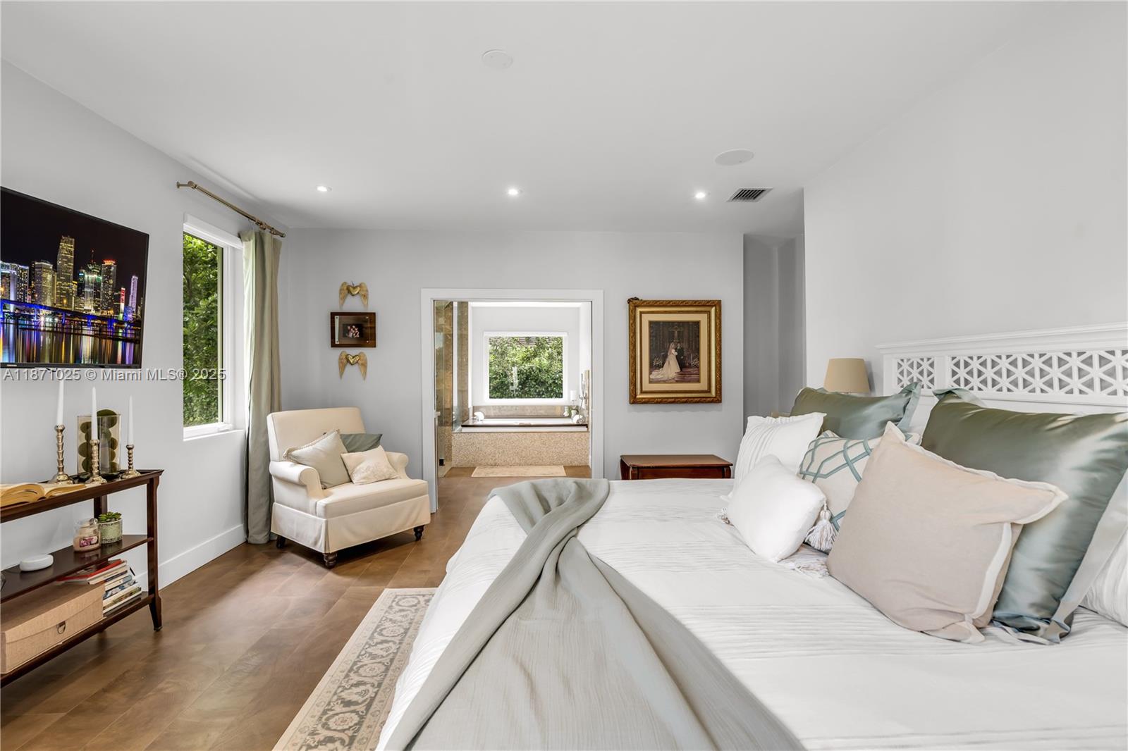 11835 Southwest 91 Avenue Miami, FL 33176 - Photo 28 of 66 a bedroom with a large bed and a couch