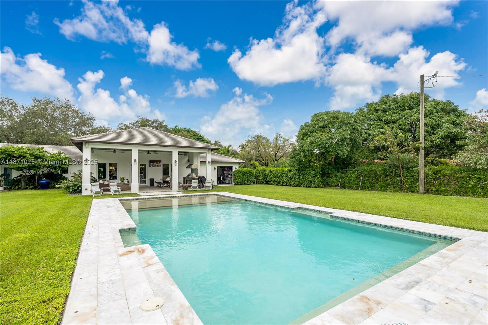 11835 Southwest 91 Avenue Miami, FL 33176 - Photo 38 of 66 a view of a house with swimming pool and a yard