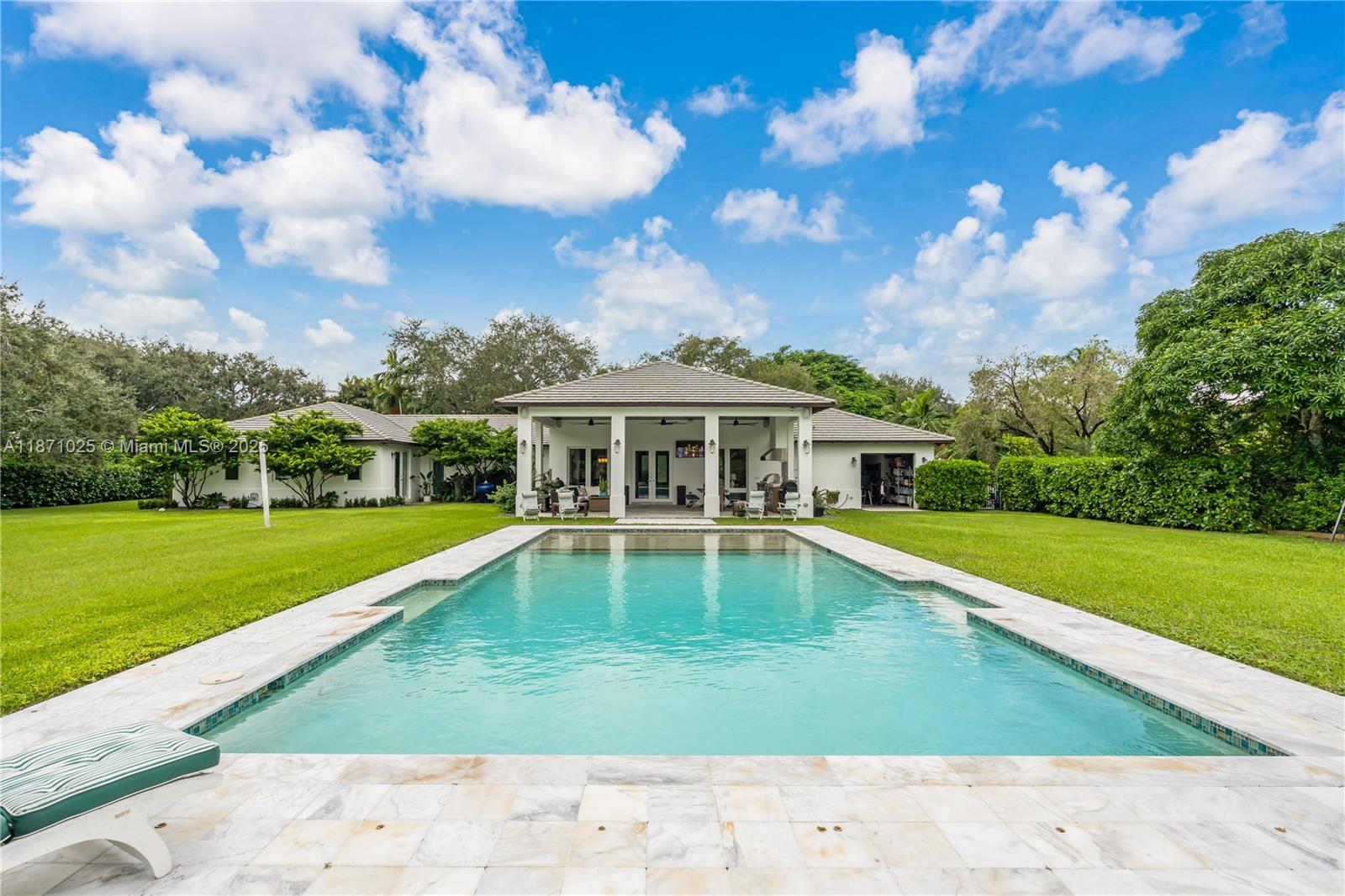 11835 Southwest 91 Avenue Miami, FL 33176 - Photo 40 of 66 a view of a house with a swimming pool