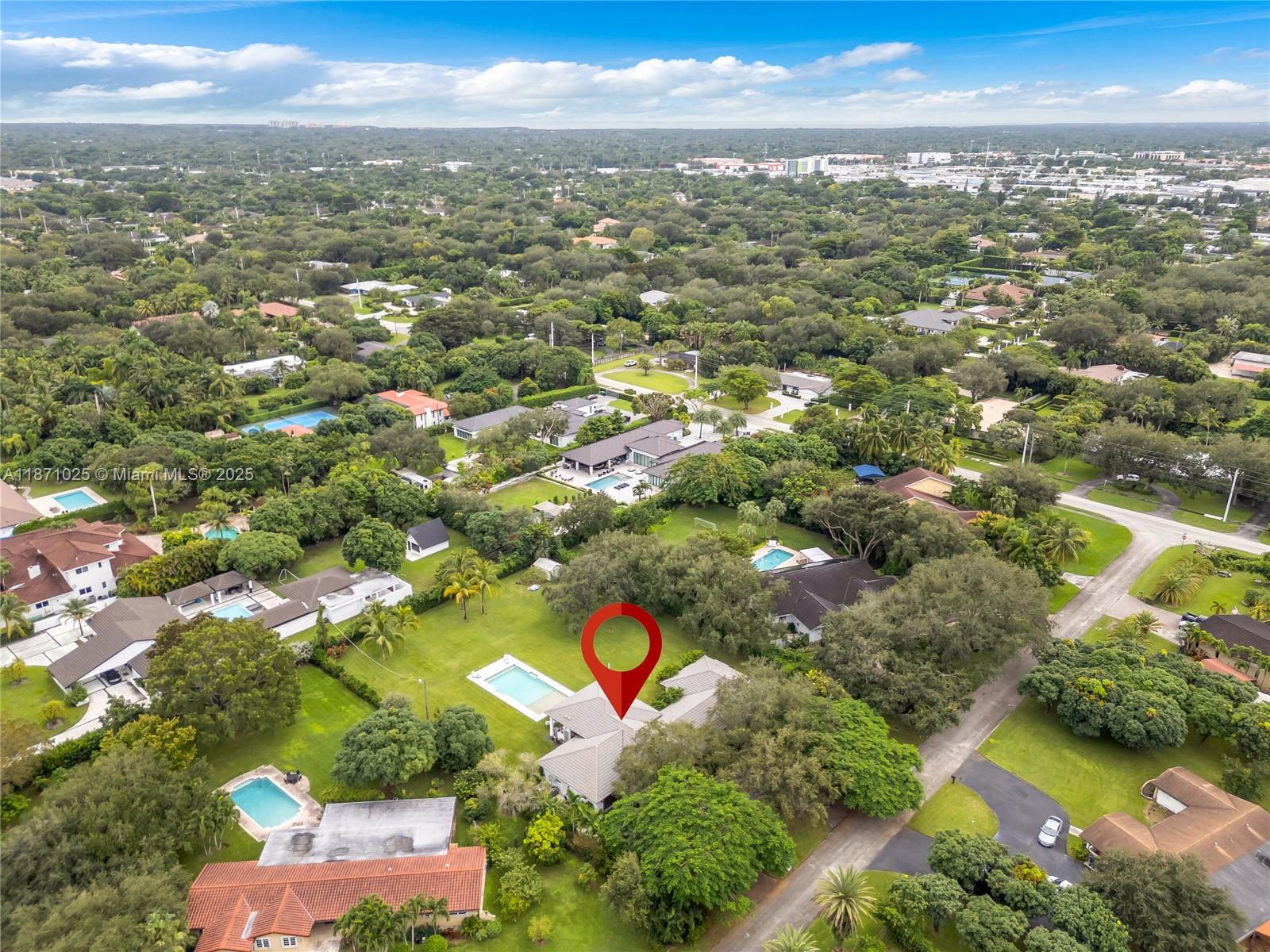 11835 Southwest 91 Avenue Miami, FL 33176 - Photo 60 of 66 an aerial view of residential houses with outdoor space and trees