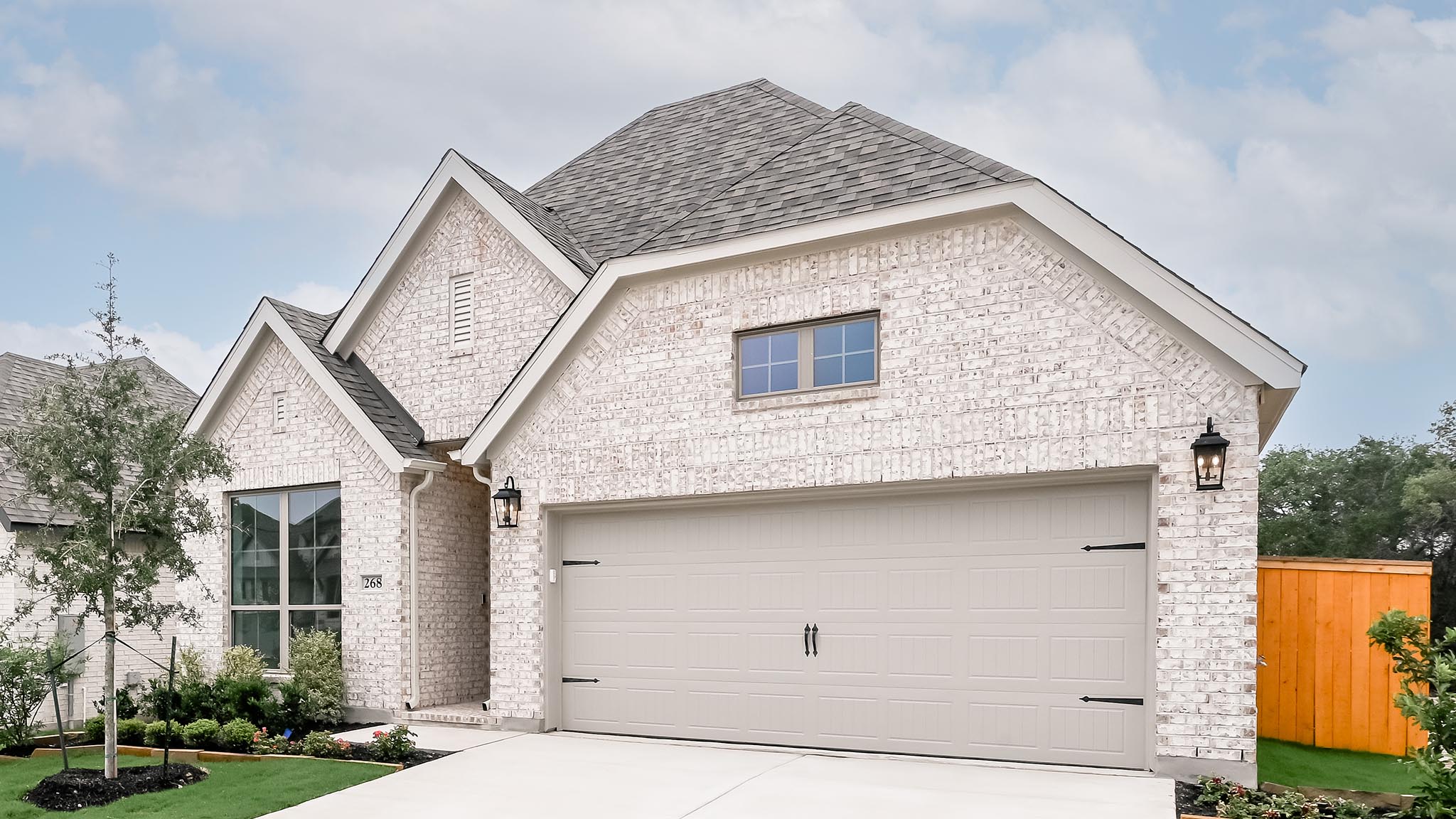 268 Basket Flower Loop Kyle, TX 78640 - Photo 12 of 27 a front view of a house with a yard