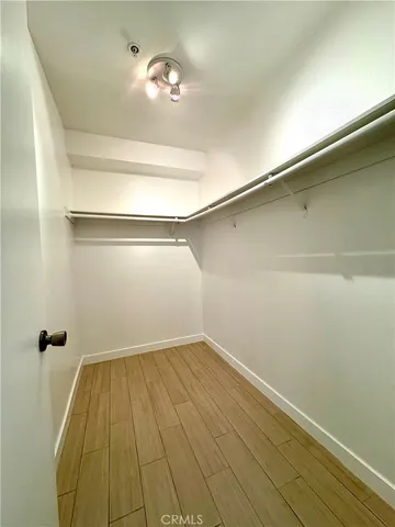 a bathroom with a double vanity sink mirror and toilet