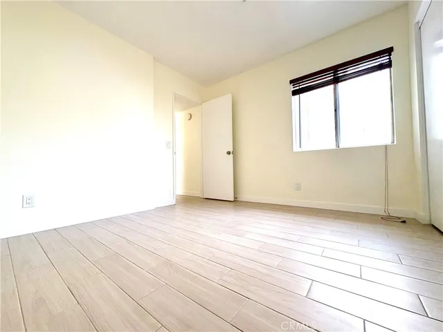 a view of a back yard from a balcony