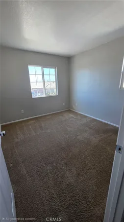 a bathroom with a toilet a sink and a window