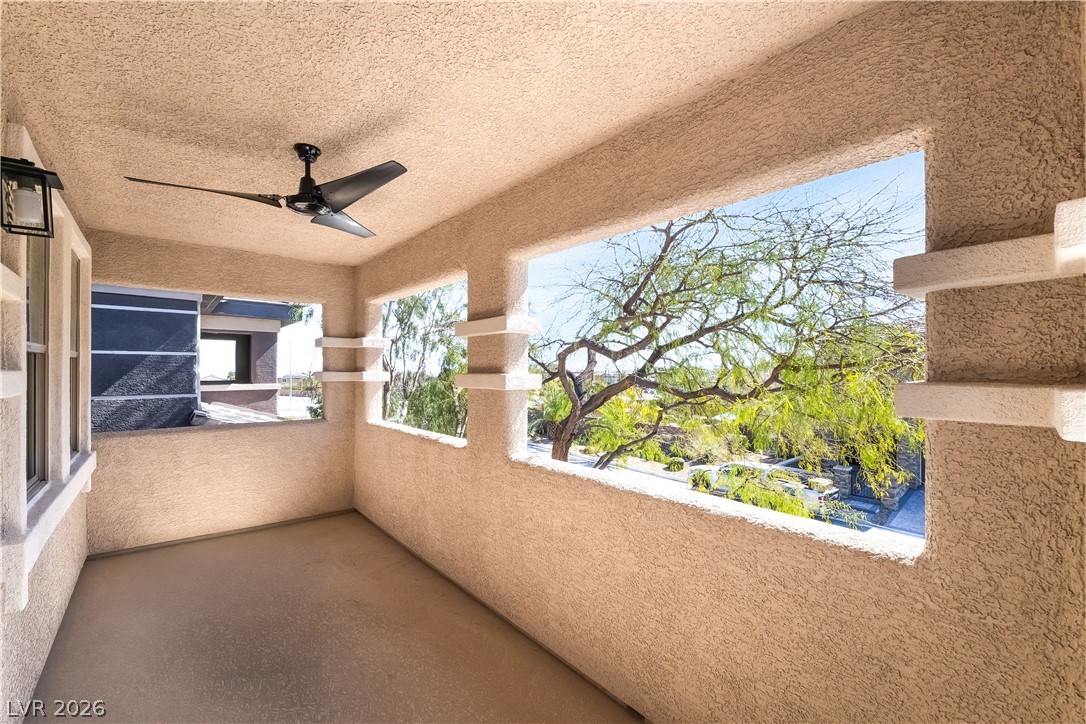 10206 Cider Mill Road Las Vegas, NV 89135 - Photo 13 of 39 Balcony with a ceiling fan
