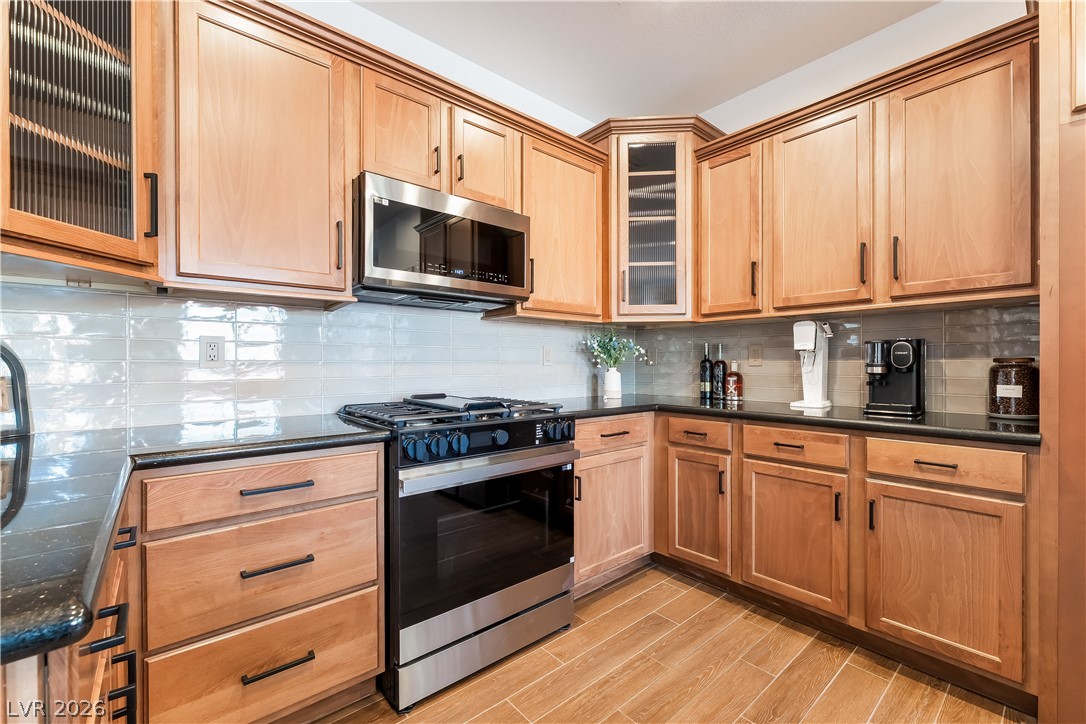 10206 Cider Mill Road Las Vegas, NV 89135 - Photo 10 of 39 All New SS Appliances and Glass Panels Cabinets
