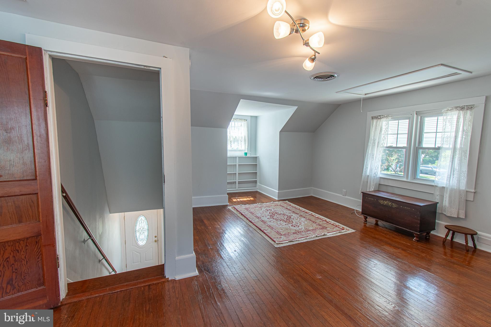 207 Crusader Road Cambridge, MD 21613 - Photo 49 of 76 a living room with furniture and a window