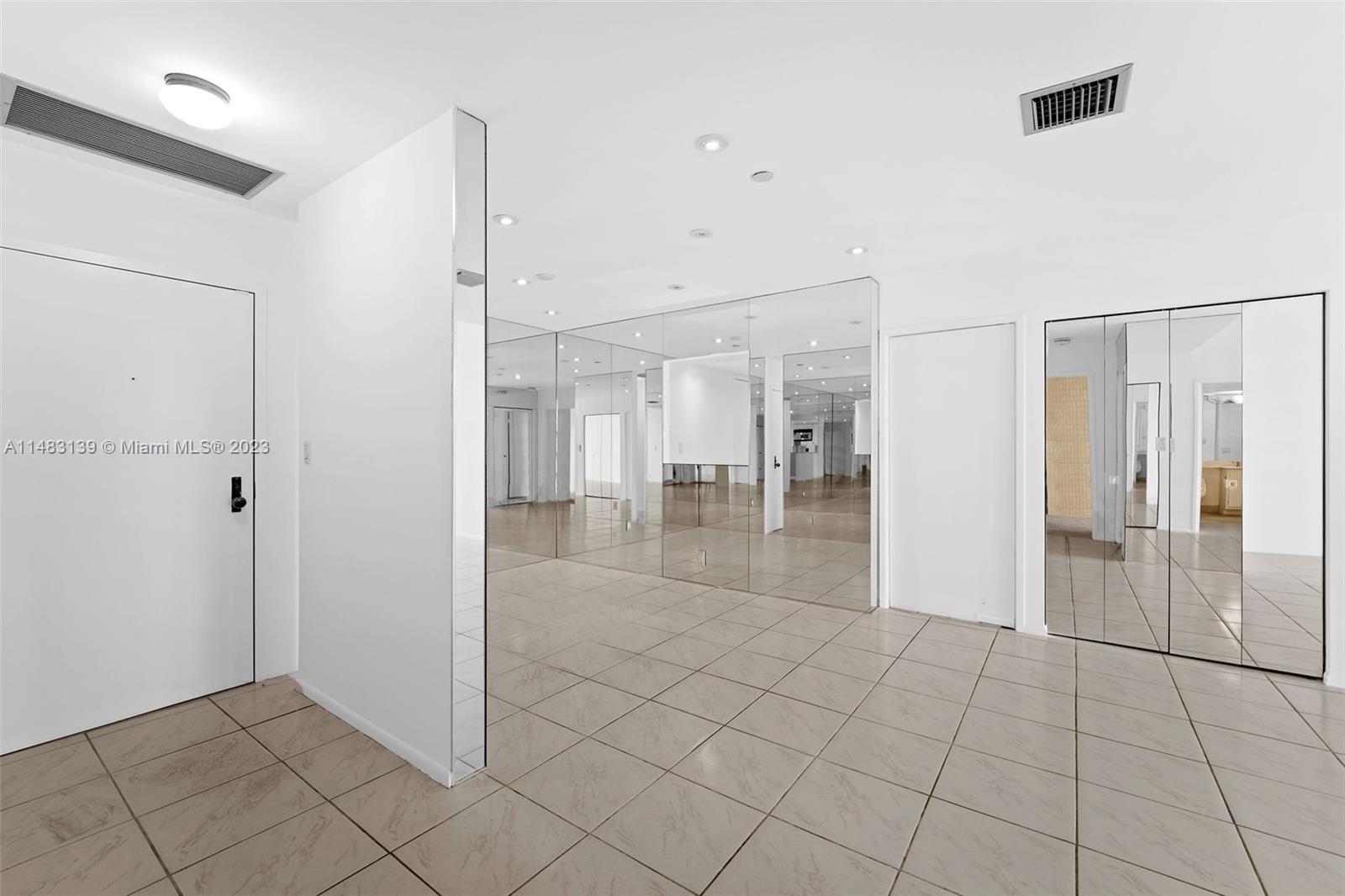 151 Crandon Boulevard, Unit 422 Key Biscayne, FL 33149 - Photo 13 of 38 a view of entryway with white walls