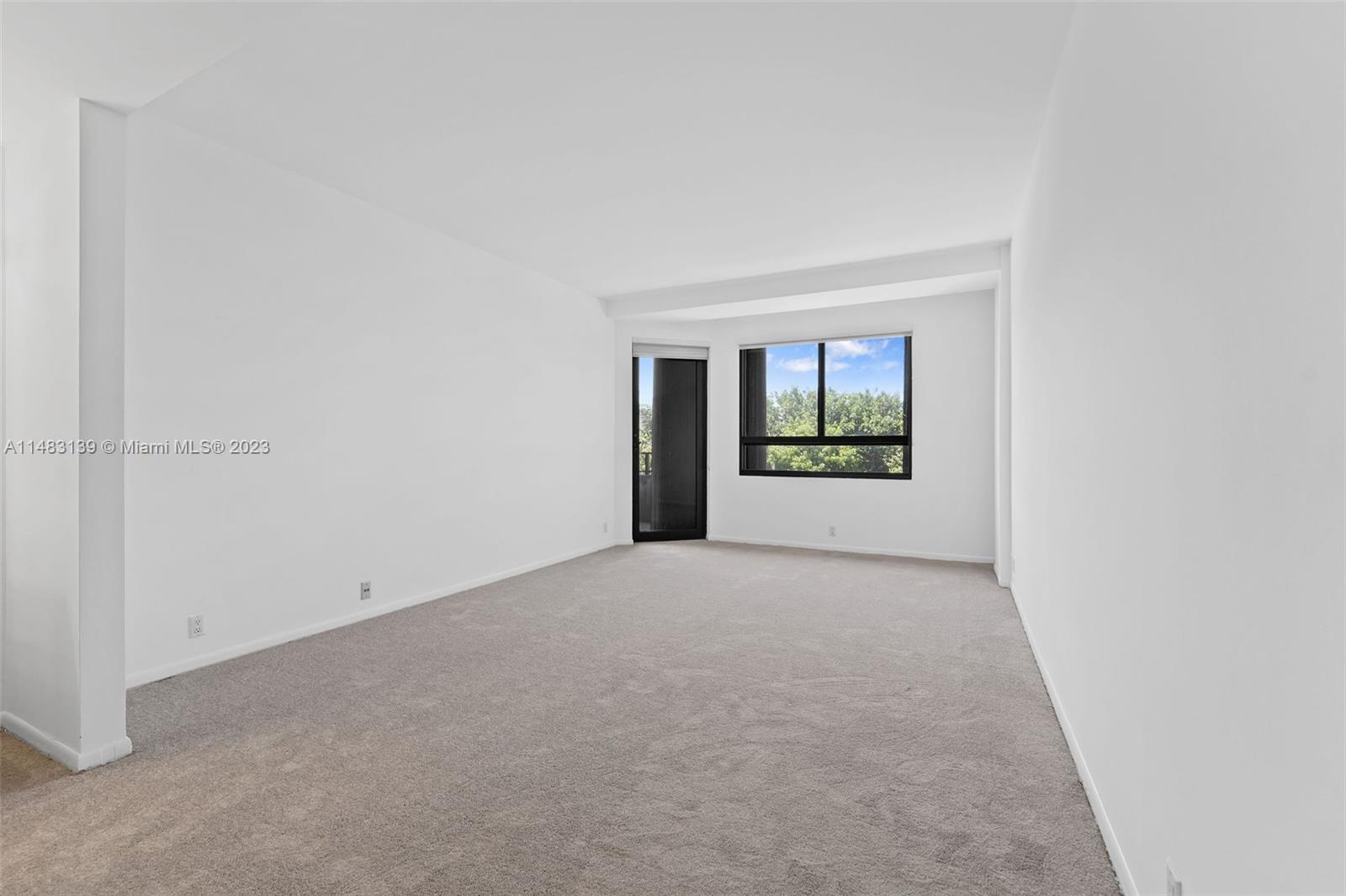 151 Crandon Boulevard, Unit 422 Key Biscayne, FL 33149 - Photo 20 of 38 a view of an empty room with a window
