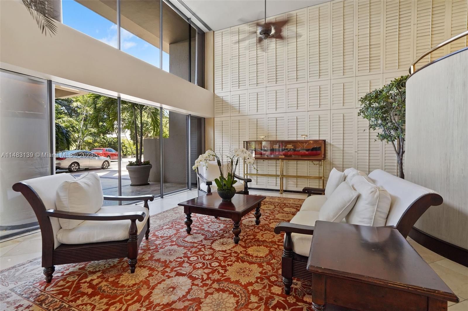151 Crandon Boulevard, Unit 422 Key Biscayne, FL 33149 - Photo 34 of 38 a living room with furniture and a potted plant