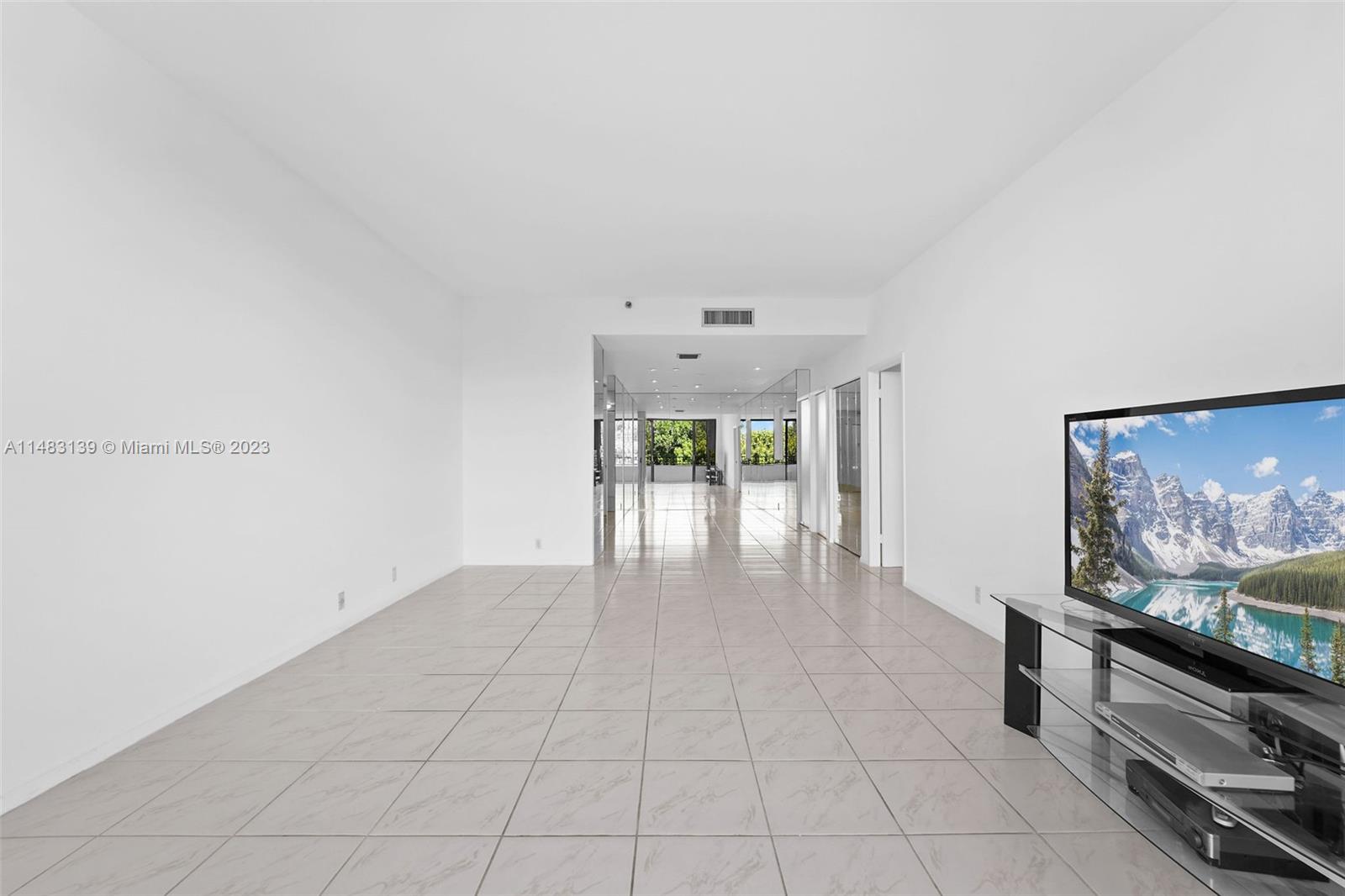 151 Crandon Boulevard, Unit 422 Key Biscayne, FL 33149 - Photo 7 of 38 a view of an empty room with window