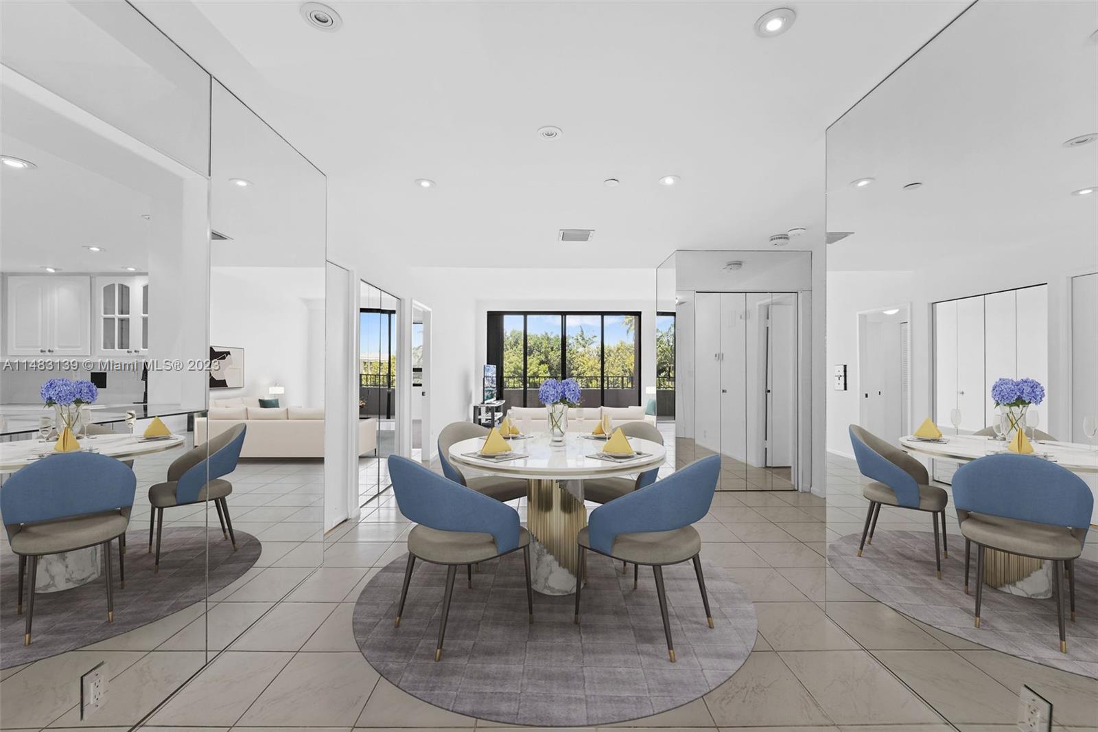 151 Crandon Boulevard, Unit 422 Key Biscayne, FL 33149 - Photo 9 of 38 a view of a dining room with furniture