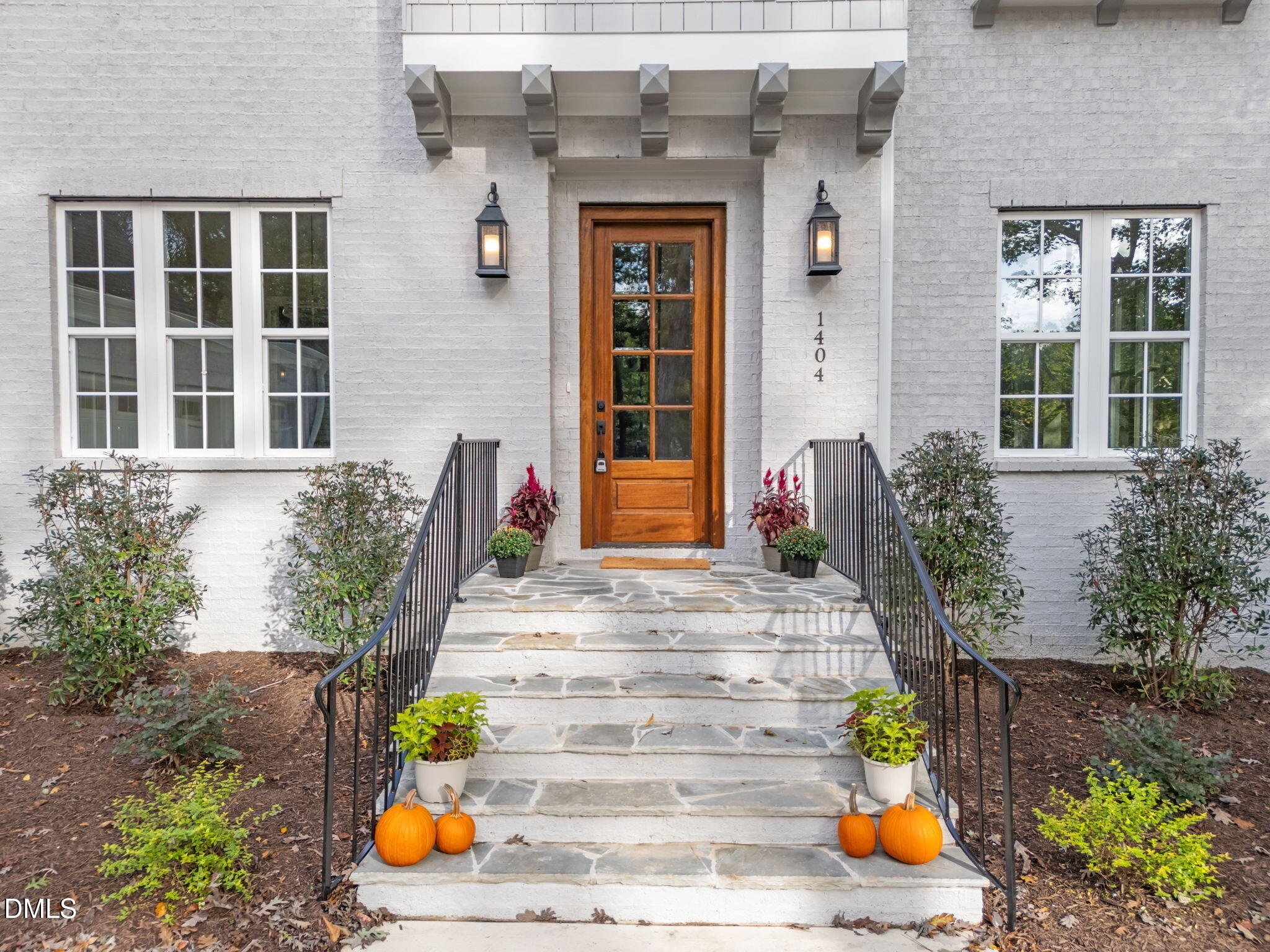 1404 Song Bird Crest Way Raleigh, NC 27613 - Photo 3 of 54 a front view of a house with a yard