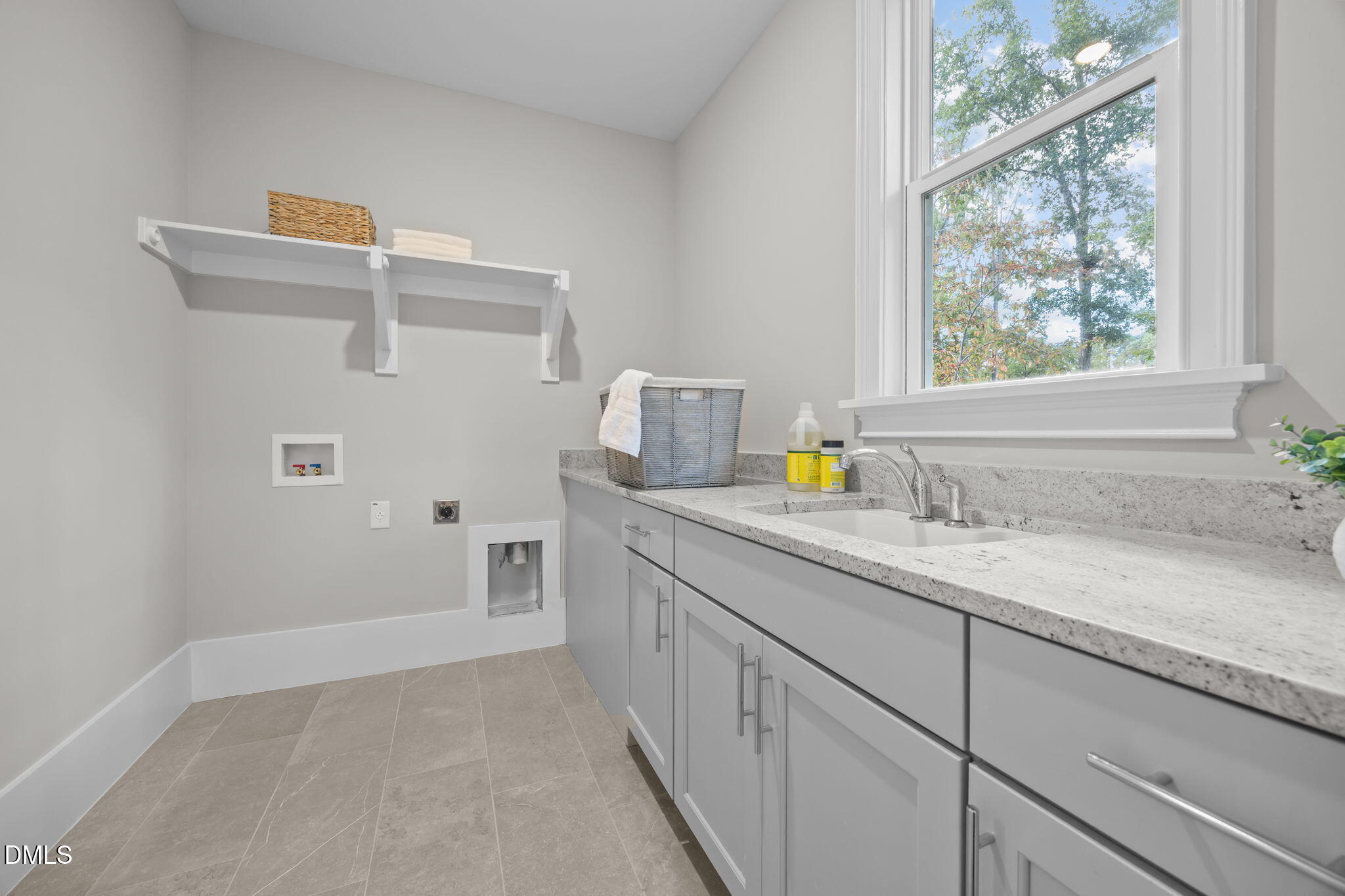 1404 Song Bird Crest Way Raleigh, NC 27613 - Photo 31 of 54 a bathroom with a granite countertop sink and a window