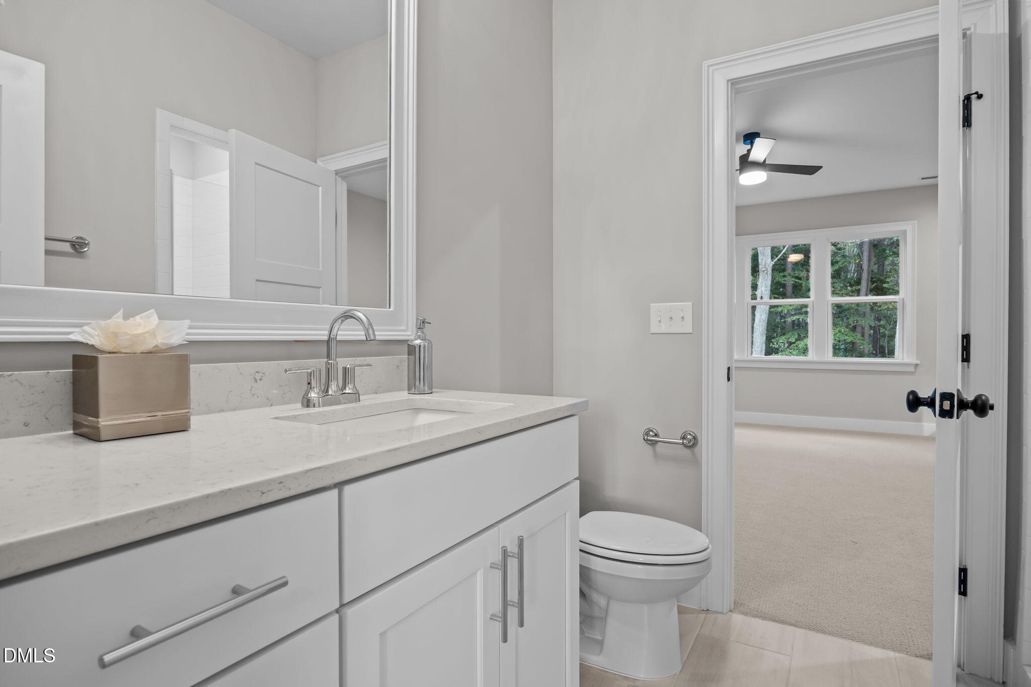 1404 Song Bird Crest Way Raleigh, NC 27613 - Photo 41 of 54 a bathroom with a granite countertop sink toilet and shower