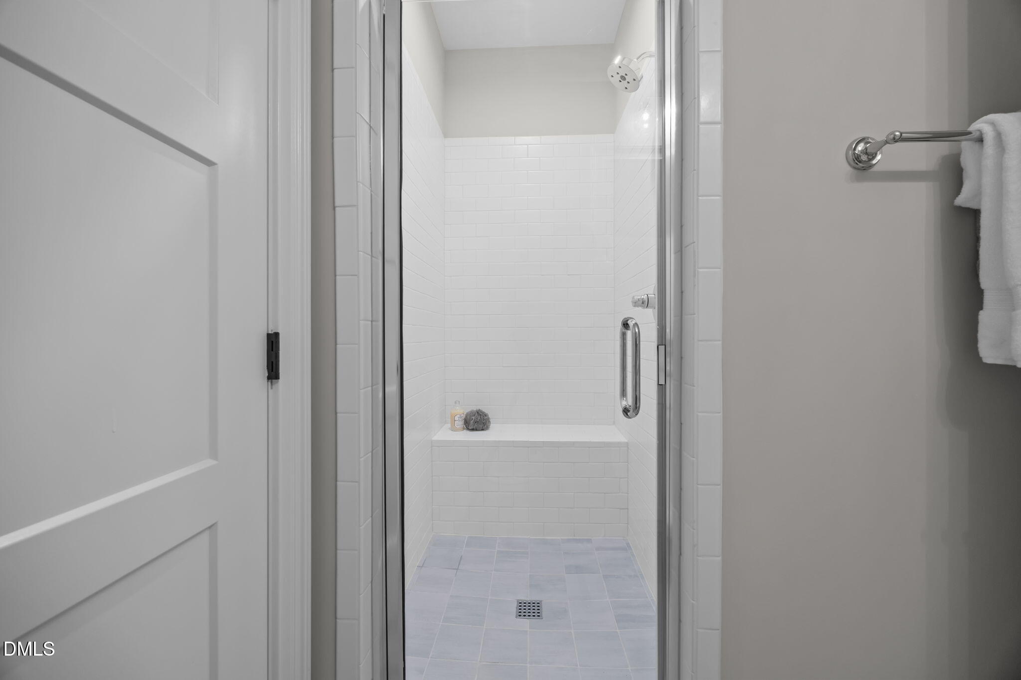 1404 Song Bird Crest Way Raleigh, NC 27613 - Photo 42 of 54 a bathroom with a glass shower door