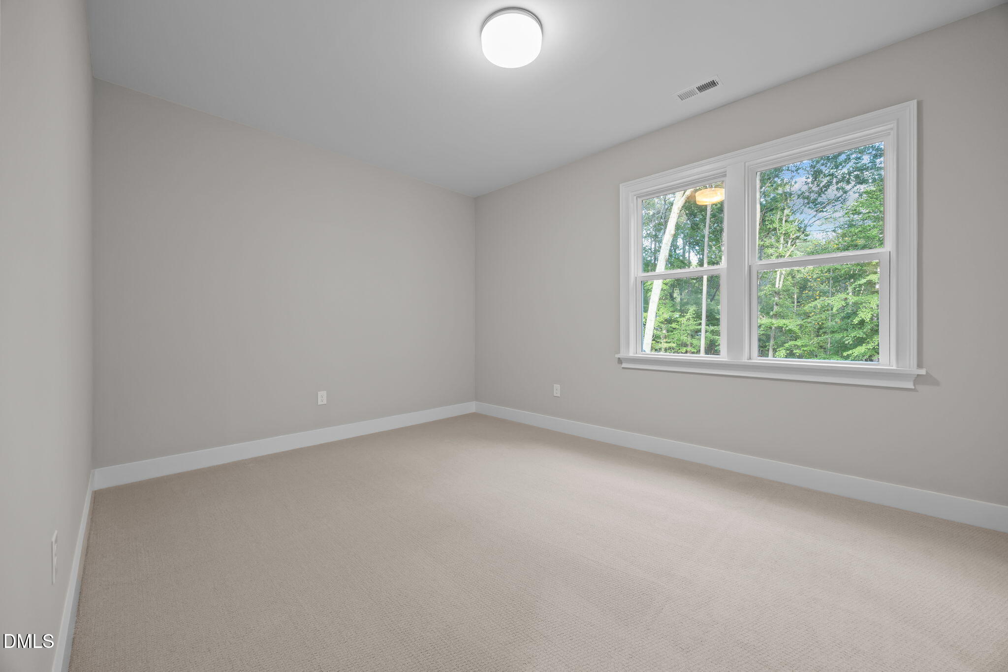 1404 Song Bird Crest Way Raleigh, NC 27613 - Photo 46 of 54 an empty room with a window
