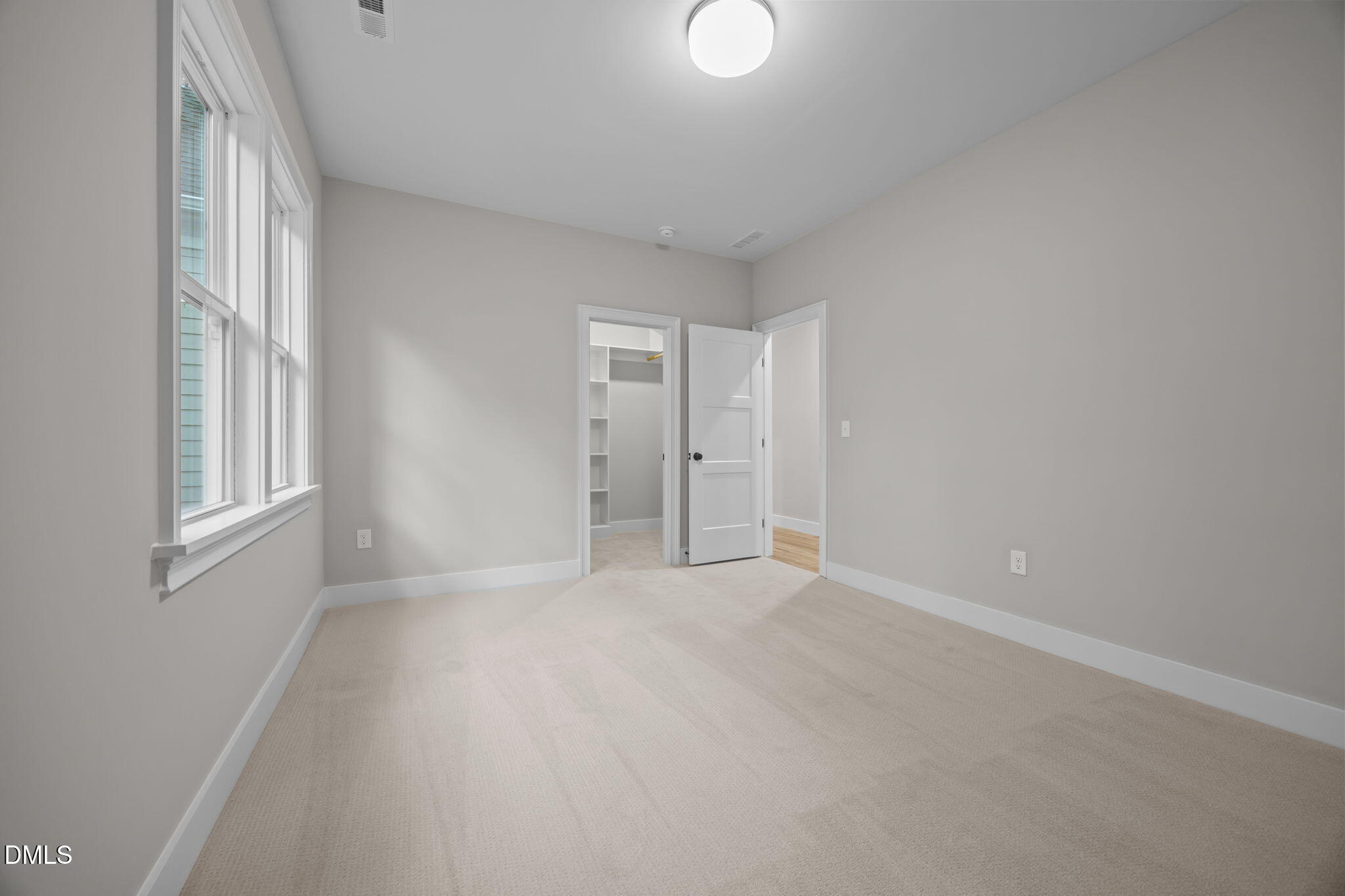 1404 Song Bird Crest Way Raleigh, NC 27613 - Photo 47 of 54 a view of an empty room with a window