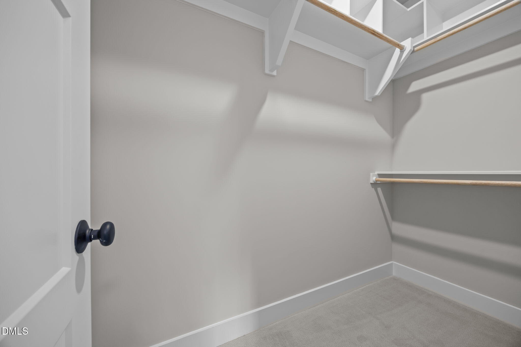 1404 Song Bird Crest Way Raleigh, NC 27613 - Photo 50 of 54 a view of small space with racks on the wall