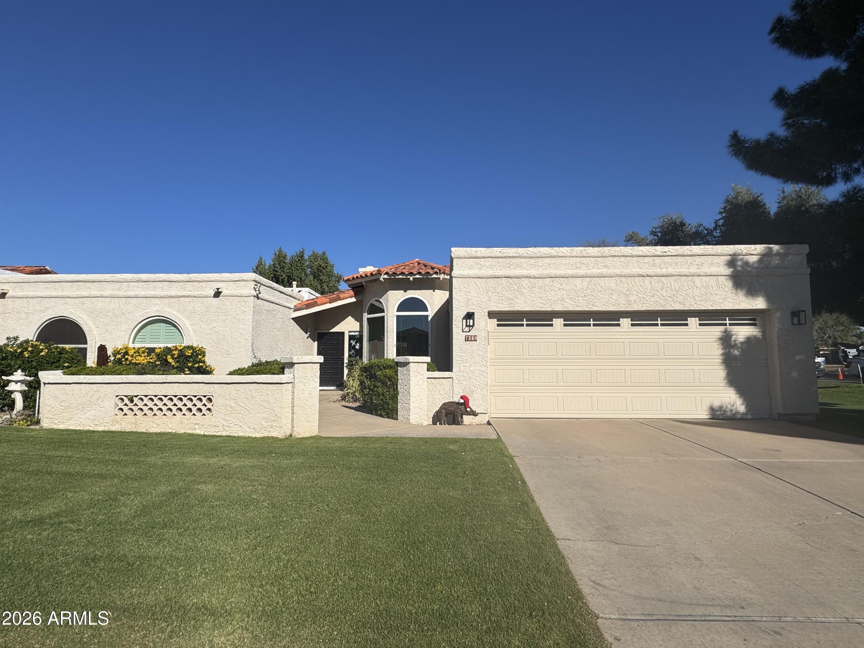 7330 East Griswold Road Scottsdale, AZ 85258 - Photo 1 of 16 a view of a street with a building in the background