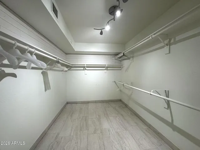 a view of a room with racks on the wall