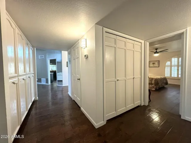 a view of a hallway with a closet
