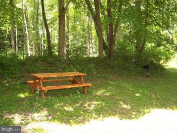 194 View Lane Augusta, WV 26704 - Photo 11 of 25 a view of a two chairs in a park