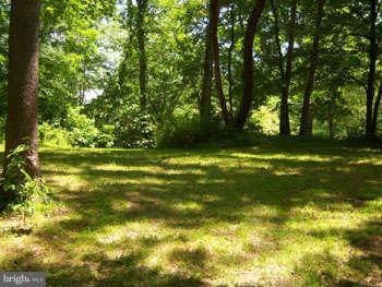 194 View Lane Augusta, WV 26704 - Photo 16 of 25 a view of a golf course with a yard