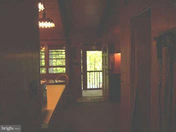194 View Lane Augusta, WV 26704 - Photo 22 of 25 a room with windows and chandelier