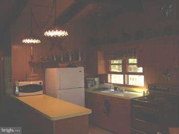 194 View Lane Augusta, WV 26704 - Photo 23 of 25 a kitchen with stainless steel appliances a refrigerator and a chandelier
