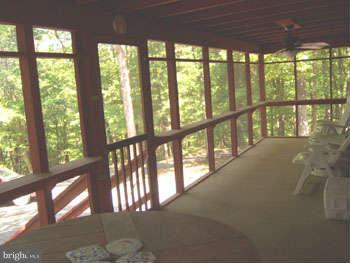 194 View Lane Augusta, WV 26704 - Photo 7 of 25 a view of an empty room with a large window