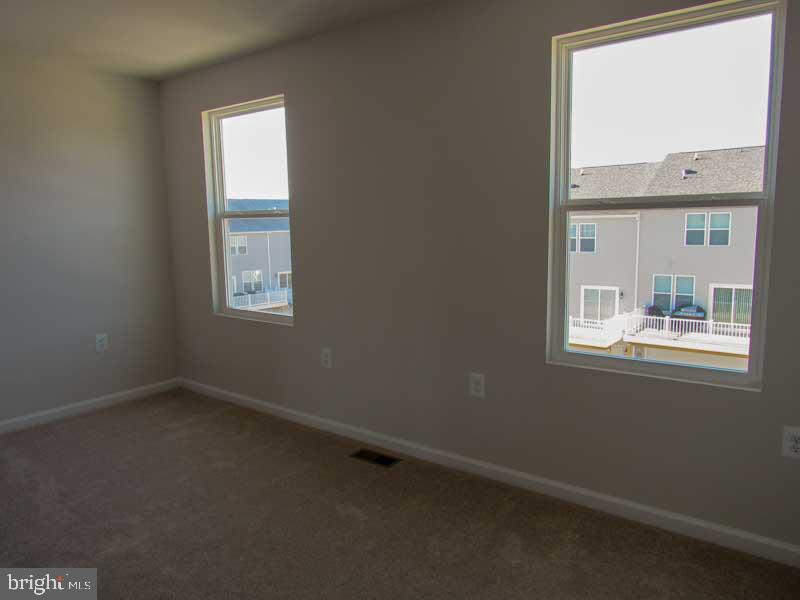 236 Anthem Street Ranson, WV 25438 - Photo 16 of 17 an empty room with a window