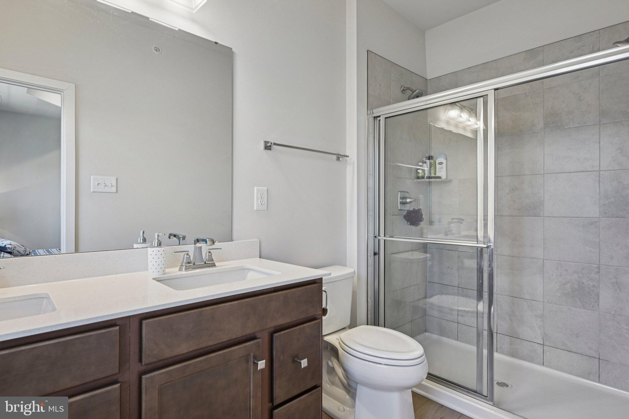 316 Longs Peak Way Exton, PA 19341 - Photo 19 of 31 a bathroom with a sink toilet and shower