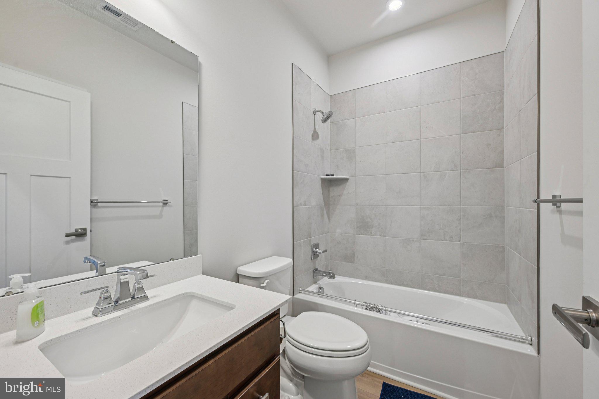 316 Longs Peak Way Exton, PA 19341 - Photo 24 of 31 a bathroom with a sink toilet tub and shower