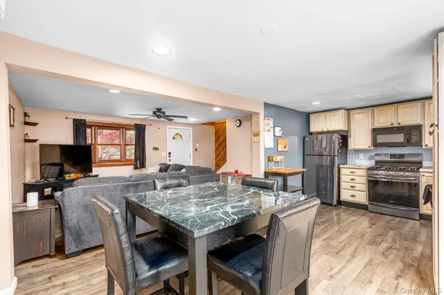 a view of a dining room with furniture