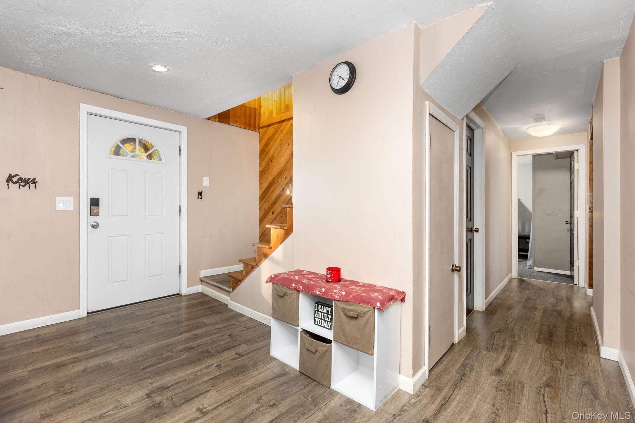 104 Riley Road New Windsor, NY 12553 - Photo 13 of 35 a view of a hallway view with wooden floor and furniture