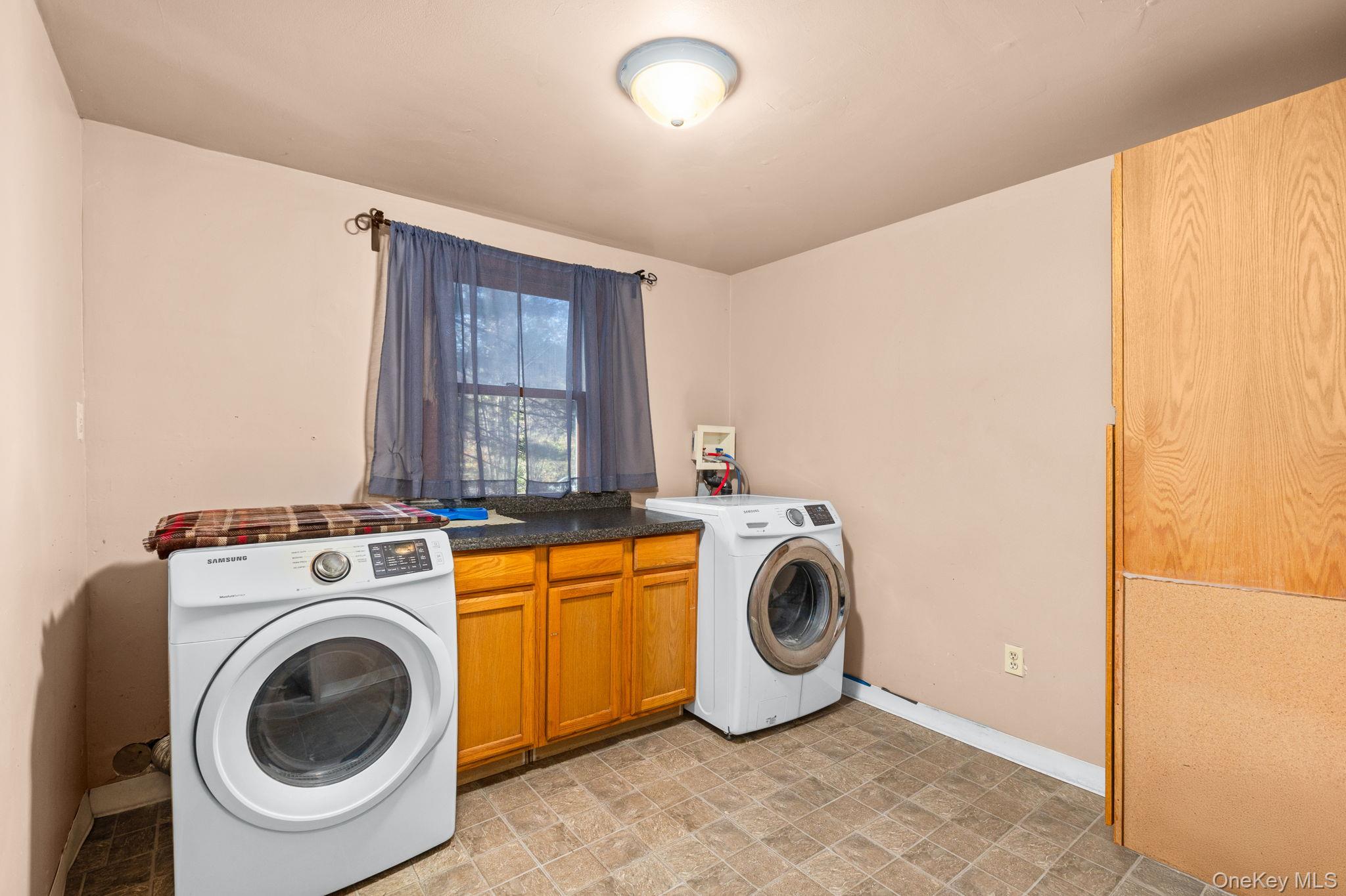 104 Riley Road New Windsor, NY 12553 - Photo 14 of 35 a utility room with dryer and washer