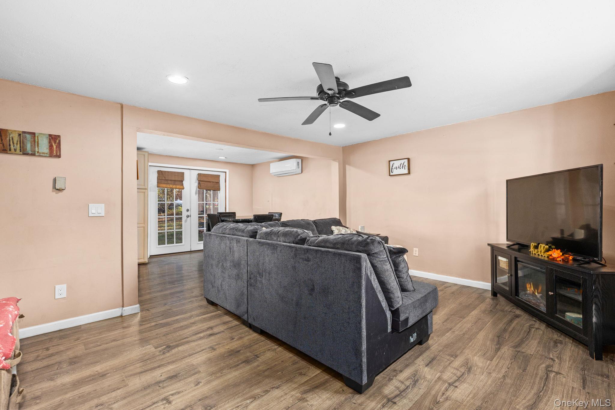 104 Riley Road New Windsor, NY 12553 - Photo 2 of 35 a living room with furniture and a flat screen tv