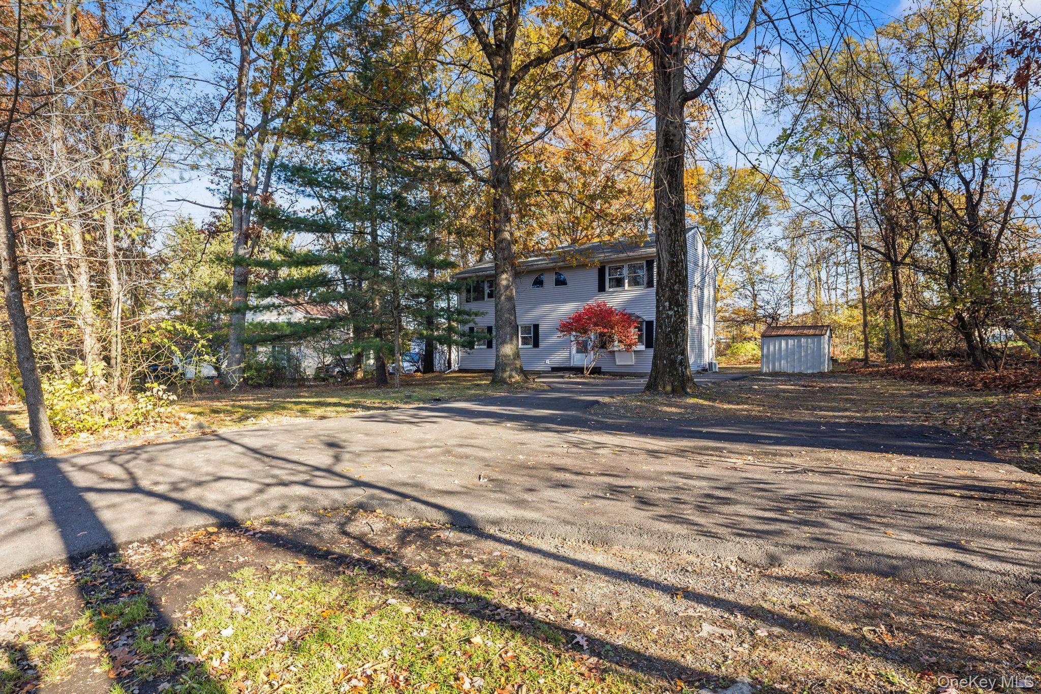 104 Riley Road New Windsor, NY 12553 - Photo 33 of 35 a view of street with large trees