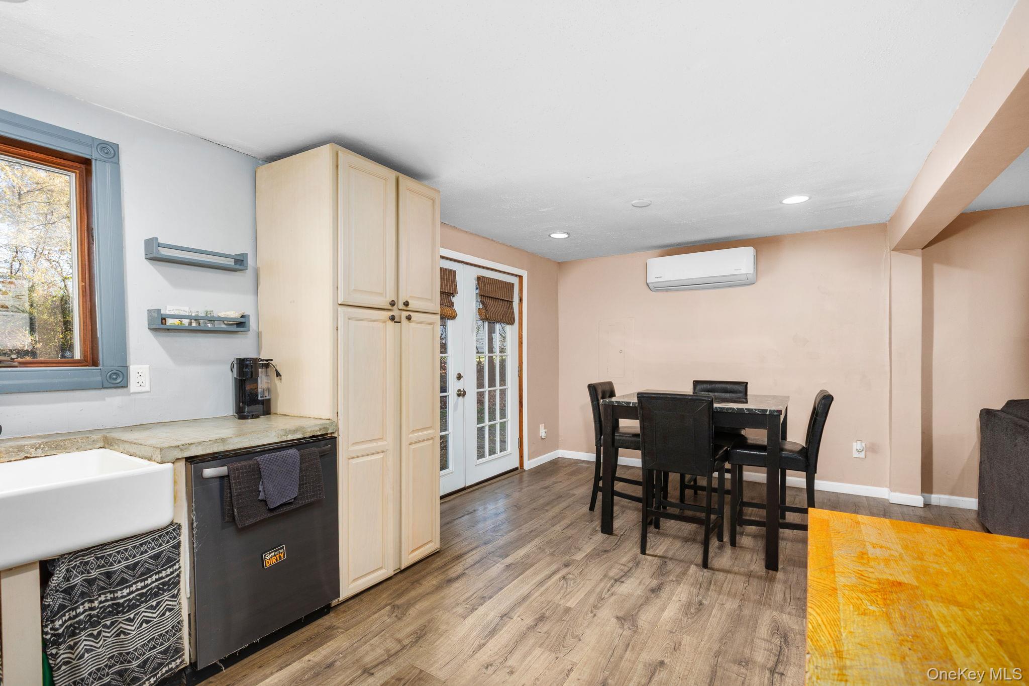 104 Riley Road New Windsor, NY 12553 - Photo 9 of 35 a kitchen with stainless steel appliances granite countertop a table chairs and a refrigerator